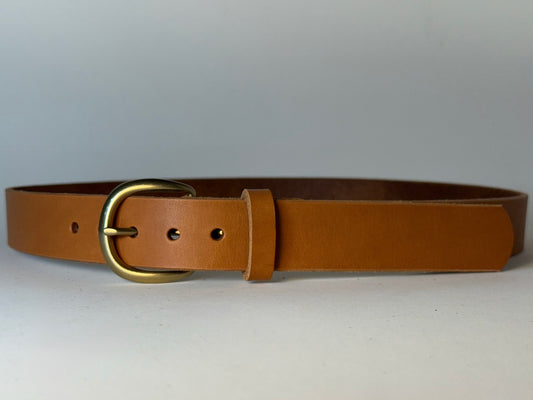 Tan  leather belt with a gold buckle on a white background
